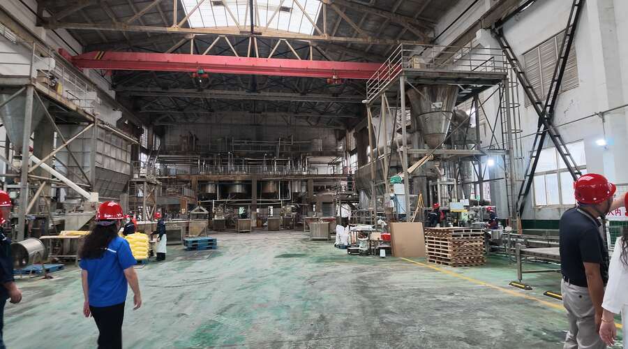 Ammonium persulfate manufacturing facility with industrial processing and packaging equipment
