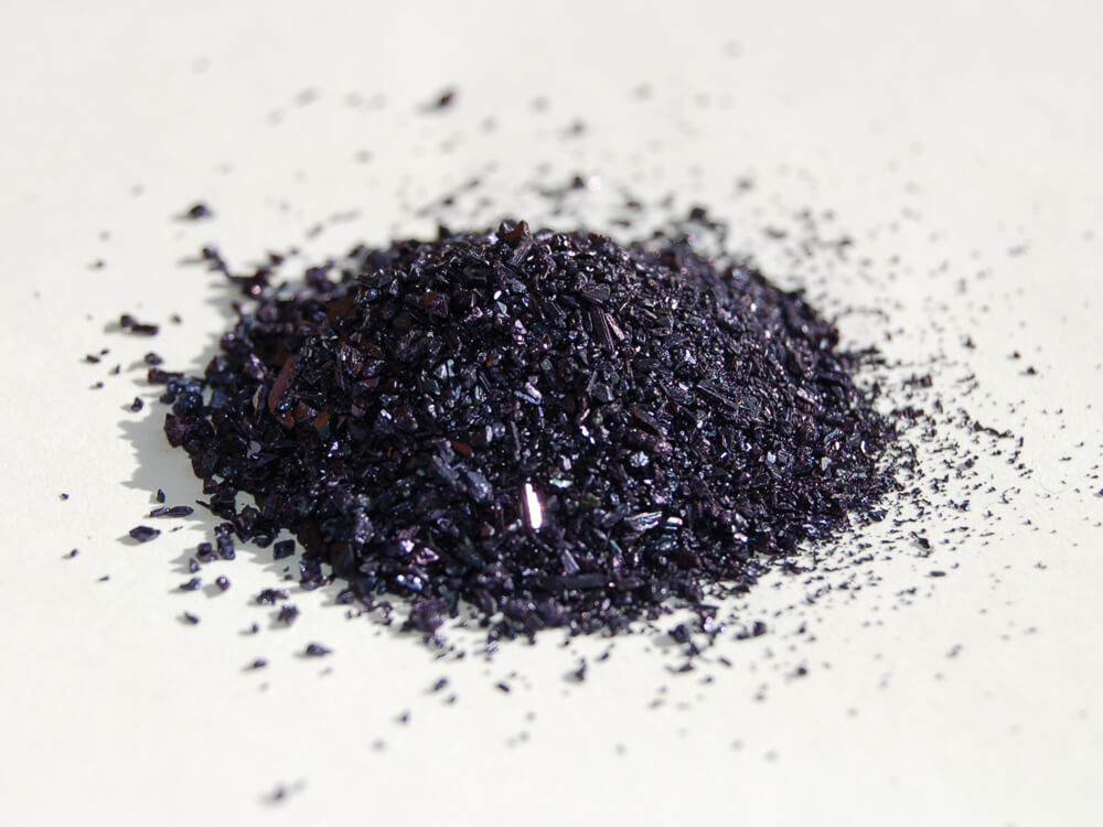 Potassium permanganate KMnO4 dark purple crystals